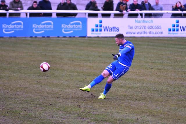 Tommy Taylor clears his lines