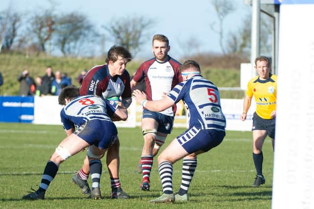 Luke Brown pushes for the Pock line