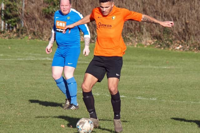 Lloyd Henderson gets on the ball