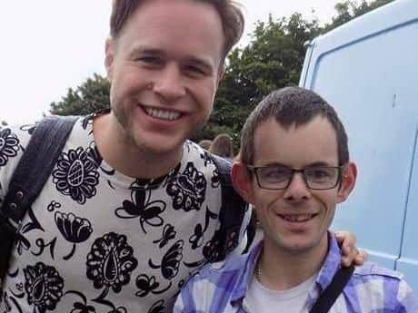 Jed with singer Olly Murs.