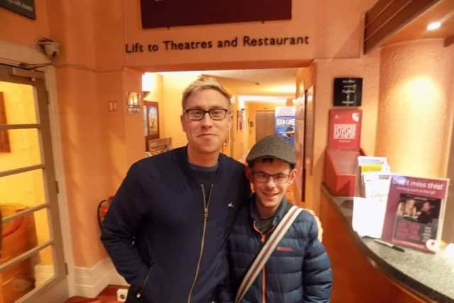 The comedian takes time to pose for a photo with Jed.