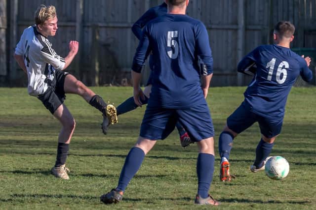 Will Cork-Dove smashes an effort on the Edgehill goal