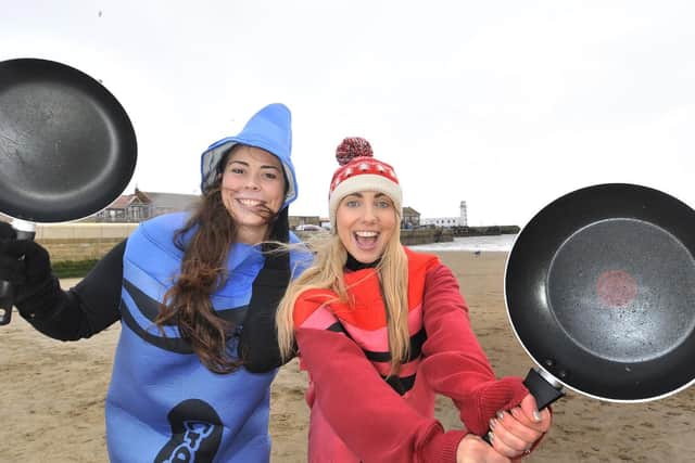 Warming up for the 2018 pancake races on the seafront, Lauren Spivey and Naomi Chaplin. 180712f