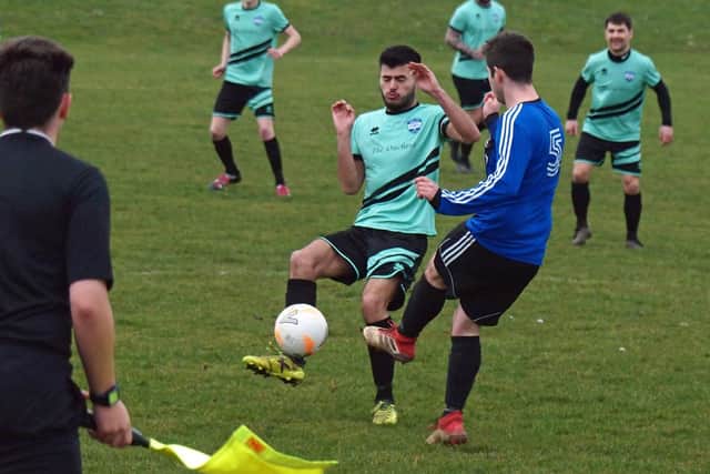 Jack Ramos closes down a Helperby opponent