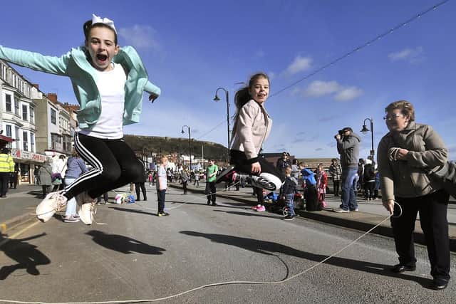 Abie and Poppy Gehrke enjoy the skipping event with their gran in 2017.