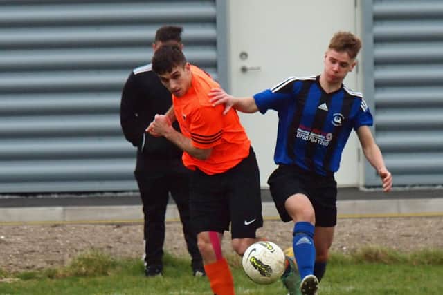 Snainton and West Pier Reserves battle for the ball