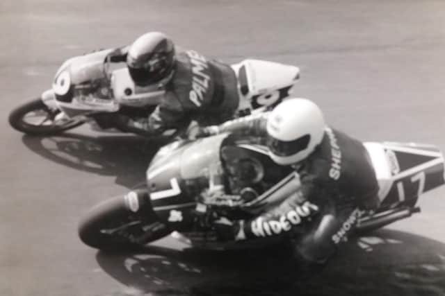 Chris Palmer battles it out with Kenny Shepherd.