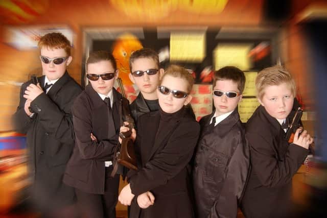 The Matrix, Men in Black, and James Bond join forces for the day. From left, Alex Glass, 11, Katie Chandler, 11, Thomas Riley, 11, Leanne Riley, 8, James Brown, 10, and Harry Taylor, 9.