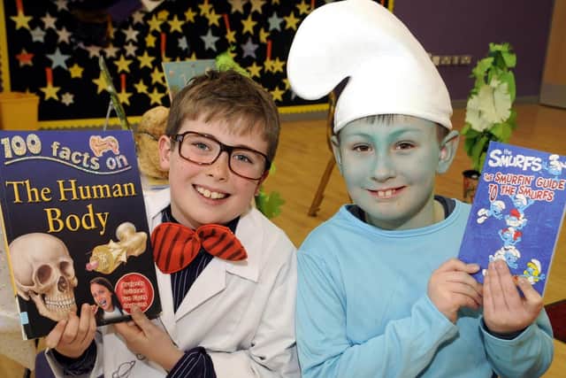 Robbie Kerr, left and Louis Winter enjoy World Book Day..