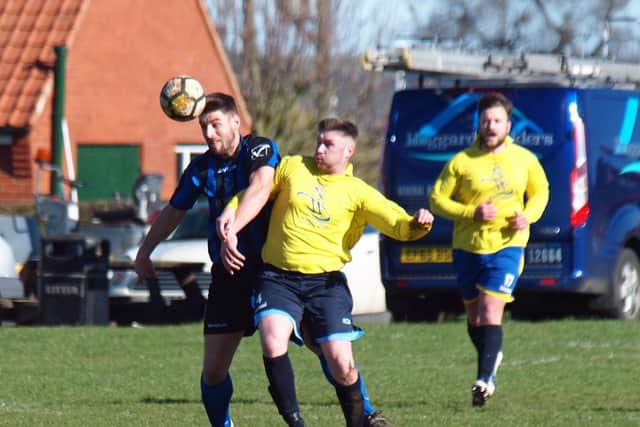 Jack Hakings battles with a Filey man