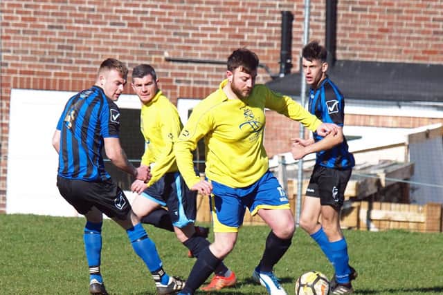 Max Gage on the ball for Town