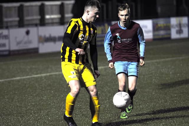 Two-goal George Walmsley on the ball