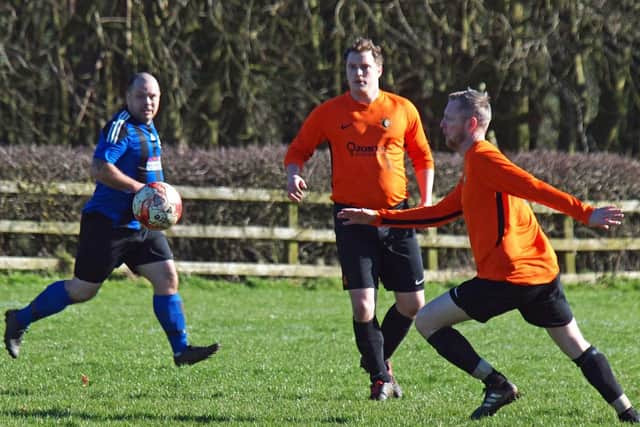 Pier and Edgehill's reserves battle for the ball