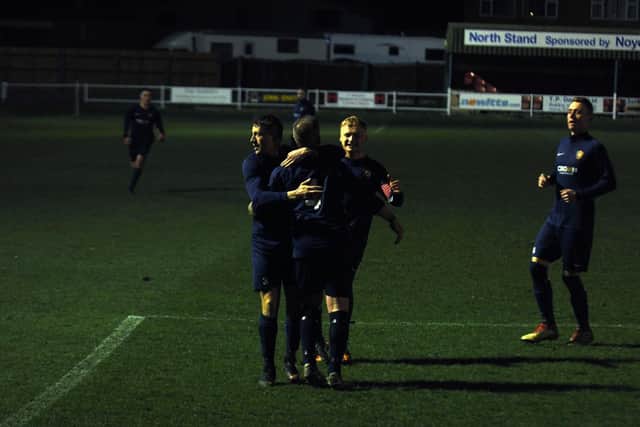 Gary Hepples is mobbed after scoring for Edgehill