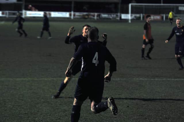 Gary Hepples runs away after scoring