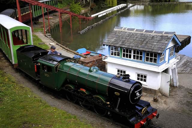 One of the trains chugs  along in North Bay