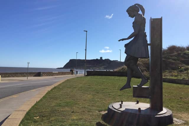 The Bathing Belle statue, once in the town centre, now stands in the North Bay, opposite The Sands shops and apartments.