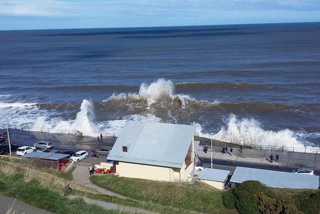 Standing up high gives great views - especially when the Drive is closed and the sea is wild ! This picture shows the back of the Oasis cafe.