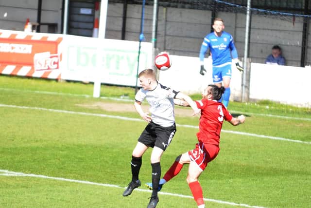 Dave Merris battles for the ball