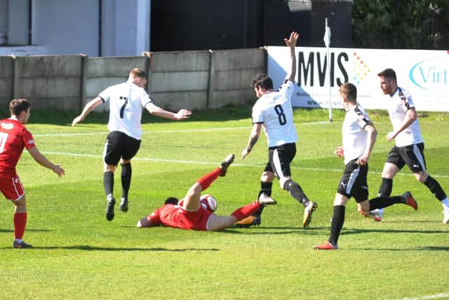 Luke Dean goes down in the box
