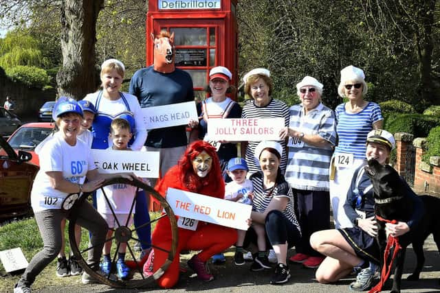Walkers are dressed up as the four pubs on the route!