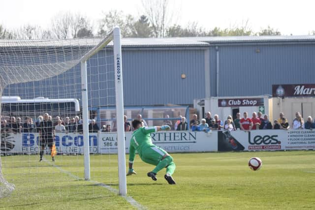 James Walshaw's pen sends the keeper the wrong way