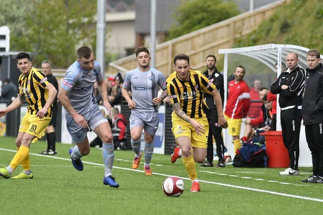 Wayne Brooksby powers down the flank