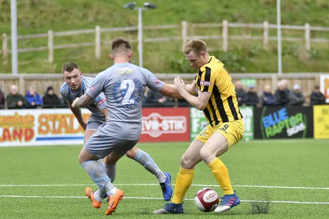 James Walshaw beats his man