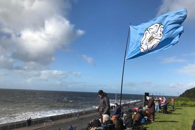 Spectators flying the Yorkshire flag. Photo: Steve Bambridge