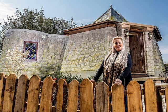 Owner Carol Cavendish outside of the new Ground Keeper's Cottage