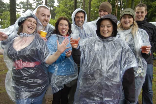 Friends celebrate a 30th birthday at the Zutons' gig in Dalby Forest in 2008.
