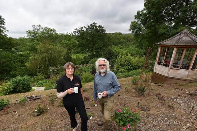 Bev Shepherd and Bob Doncaster in the Newly Planted Rose Garden