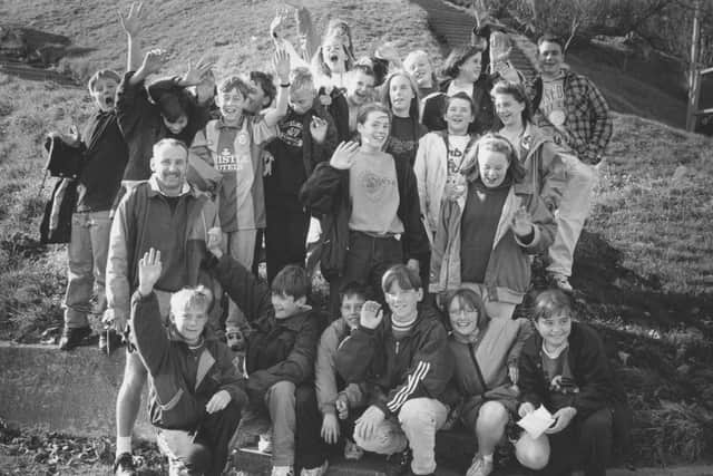 Filey School took part in a beach walk in October 1993. 
Pictured here are form 8C raring to go at the start of their autumnal walk 26 years ago.