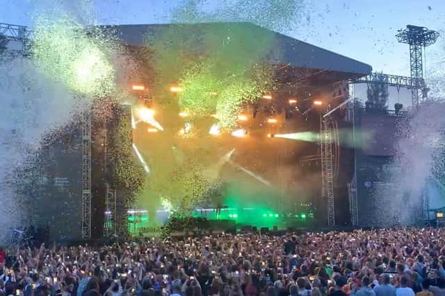 As part of his grand entrance to the stage confetti canons were sprayed over the crowd of 8,000 people. Photo: Jade McElwee