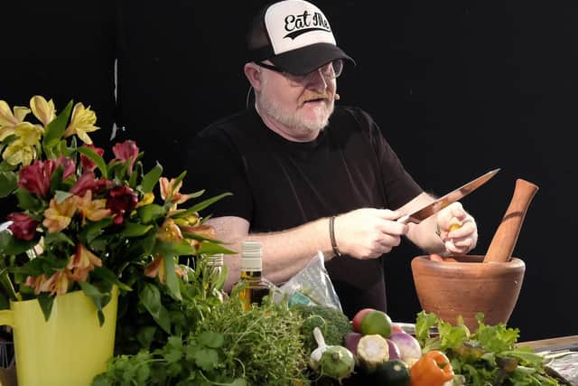 Martin Hyde from Eat Me Cafe gives a food demonstration.