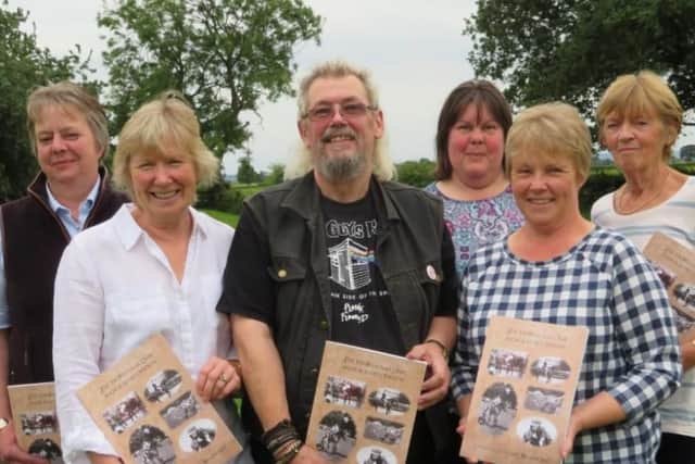 Martin Blythe, chairman of Thornton le Dale Show and Sports Society with the group who researched and wrote the Souvenir Book. Left to right Sarah Beal, Gena Douglas, Helen Pashby, Lorraine Walker and Carol Fitz-Gibbon.
