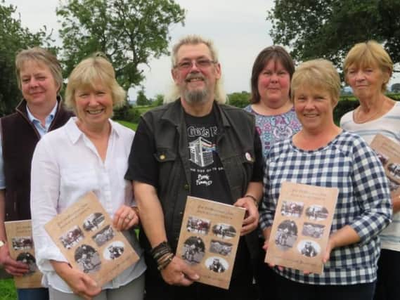 Martin Blythe, chairman of Thornton le Dale Show and Sports Society with the group who researched and wrote the Souvenir Book. Left to right Sarah Beal, Gena Douglas, Helen Pashby, Lorraine Walker and Carol Fitz-Gibbon.