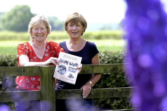 Gena Douglas, show secretary and Carol Fitz-Gibbon who edited and compiled the book