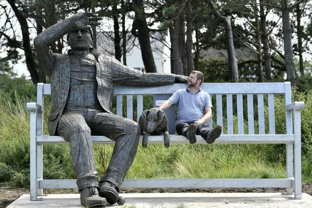 Commissioned by Silloth businessman Peter Richardson, who died last year, it depicts a man sitting on a bench looking out over the Solway with his dog.