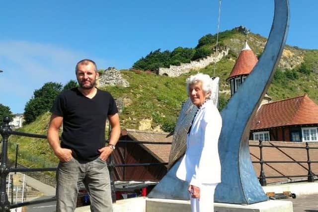 Pictured is the artist with Maureen Robinson, who bought both this and Ray's two other sculptures in Scarborough, to be enjoyed by the town.