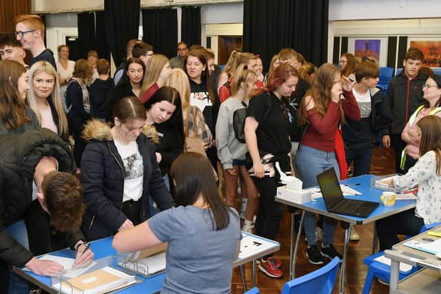 Students collecting their results