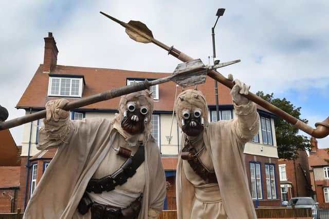 Sand people looking for the Beach