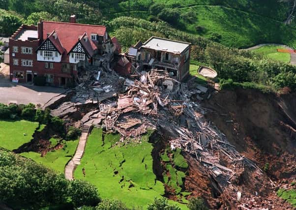 File photo dated 8/6/1993 of the scene at the Holbeck Hall Hotel in Scarborough, North Yorks, after a massive landslip. A local authority was today cleared of causing the destruction of the 120-year-old luxury Victorian hotel which collapsed 150ft down a cliff face to the beach below. A High Court judge ruled in 1997 that Scarborough Council had breached its duty of care but the Court of Appeal overruled the decision, Tuesday February 22, 2000. See PA story COURTS Hotel. PA photo: John Giles.