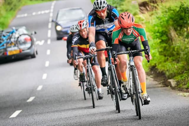 Rules for motorists overtaking cyclists are now under review, with some parts of the UK introducing penalties for those who drive too closely (Photo: Shutterstock)