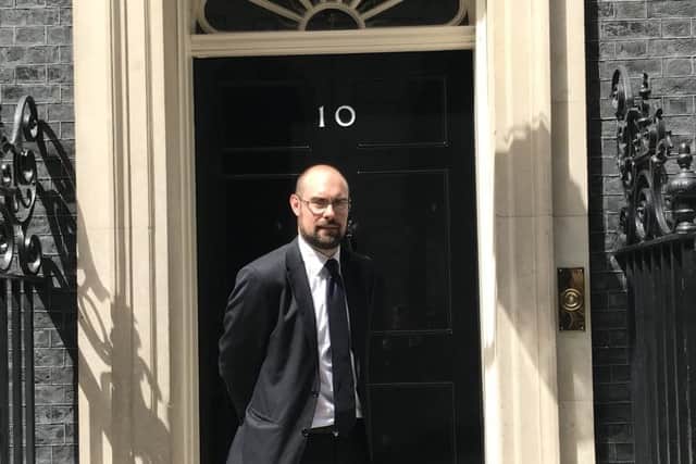 Richard Askew is pictured outside Number 10 Downing Street.
