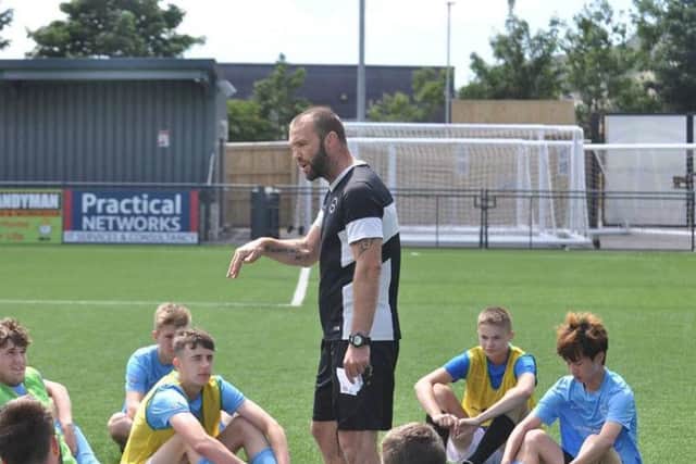 Boro Under-19s joint-manager Denny Ingram talks to the trialists