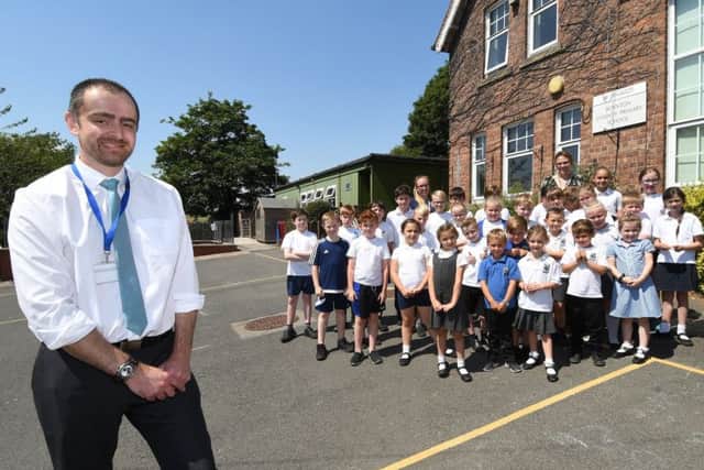 Headteacher Luke Fletcher with pupils at Boynton Primary School. Picture by Paul Atkinson