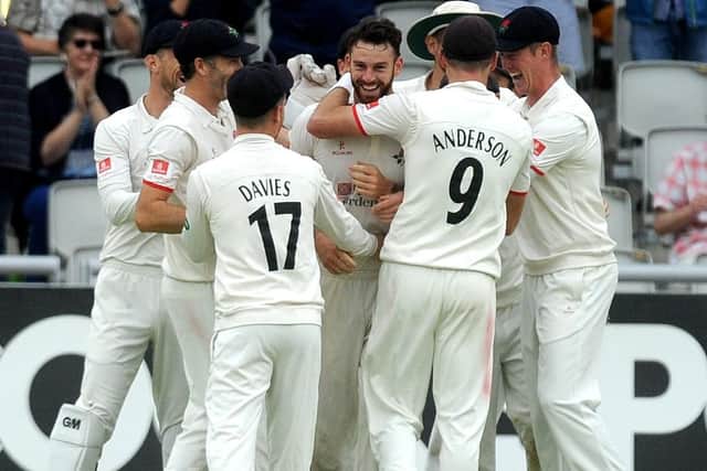 GOT THEM! Lancashire celebrate Jordan Clark's memorable Roses hat-trick at Old Trafford. Picture: Steve Riding.