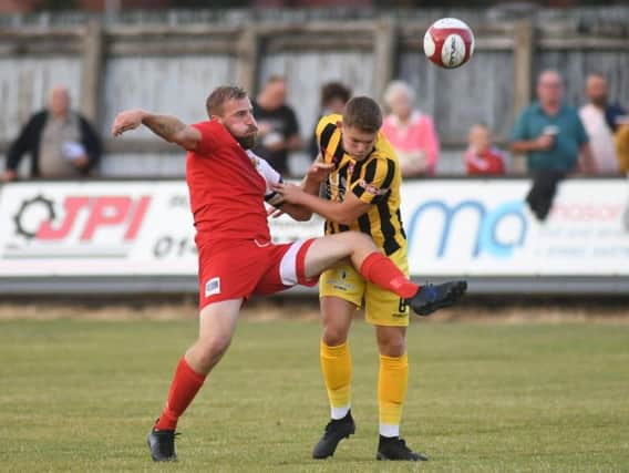 Bailey Gooda gets stuck into Brid's Jake Day