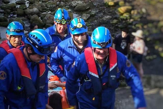 The nine-year-old fell around three metres onto rocks